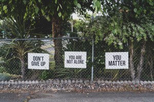 Treating the opioid crisis. Signs show messages of support to people suffering from opioid use disorder